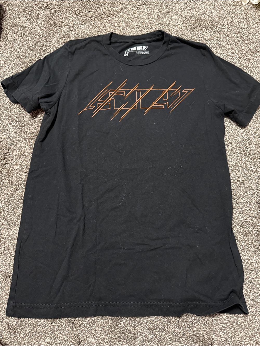 Black tee with orange logo